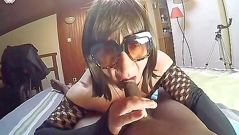 Ebony deepthroats big black cock in homemade porn 2001