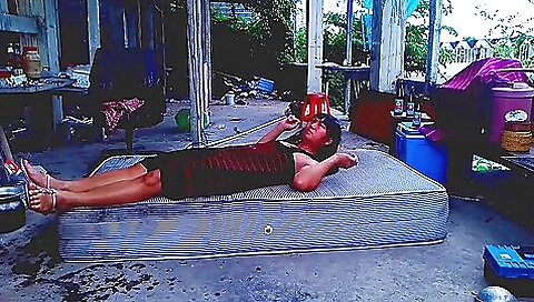 Asian brunette ladyboy with tits and ass in outdoor