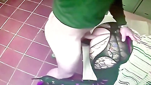 Busty brunette in sexy stockings plays with a big cock