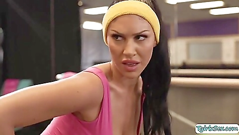 Busty blonde babe with a sexy tattooed body gives a massage