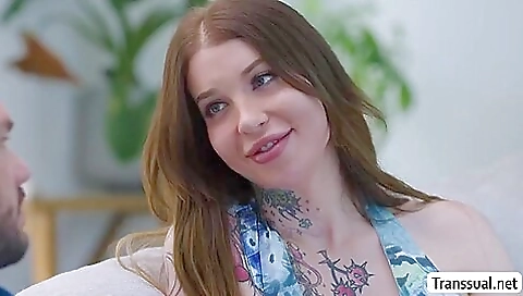 Busty blonde shemale with tattoos gets her ass licked